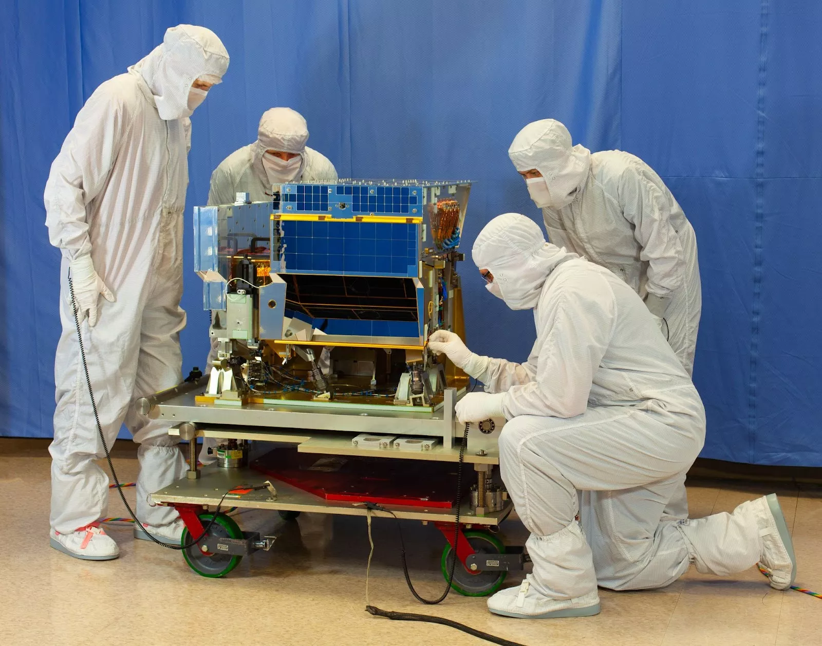 Image of scientists in a clean lab