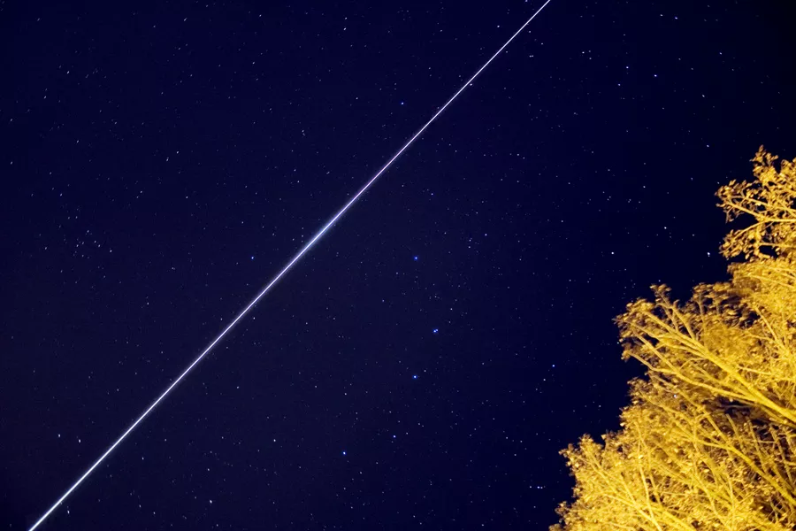 space station visible at night